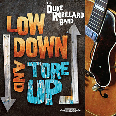 LOW DOWN AND TORE UP